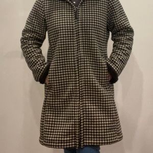 Gently worn, very comfy and loose fitting.Double zipper